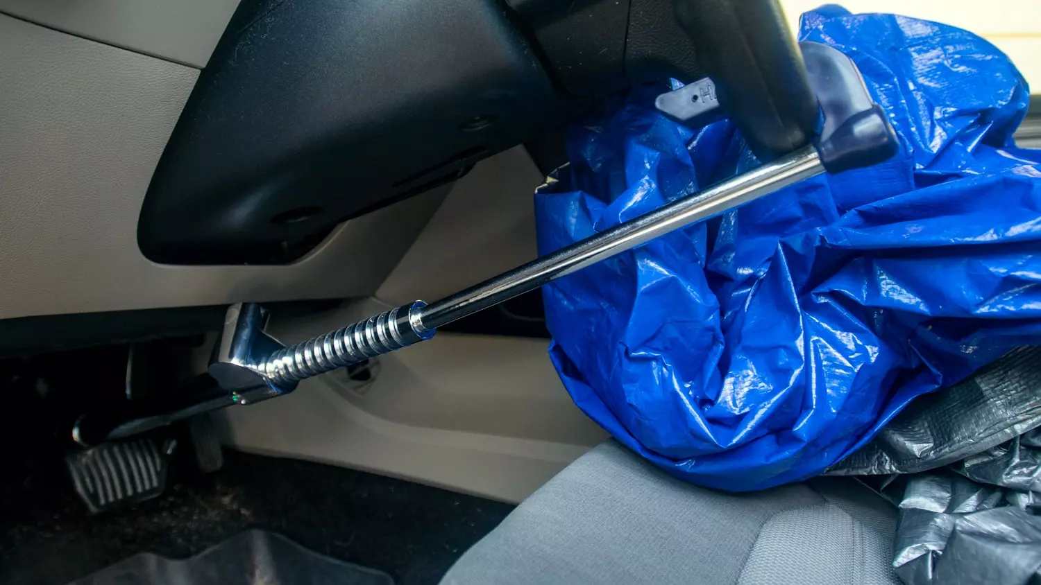 The Tevlaphee Wheel Lock installed on a steering wheel of a vehicle for testing.